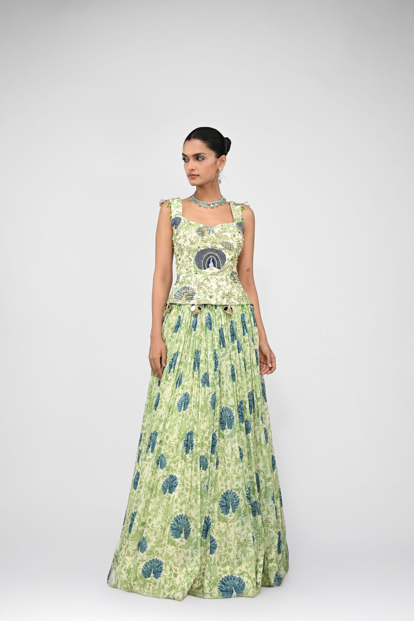 Peacock Highlighted Lehenga Paired With Highlighted Peacock Corset