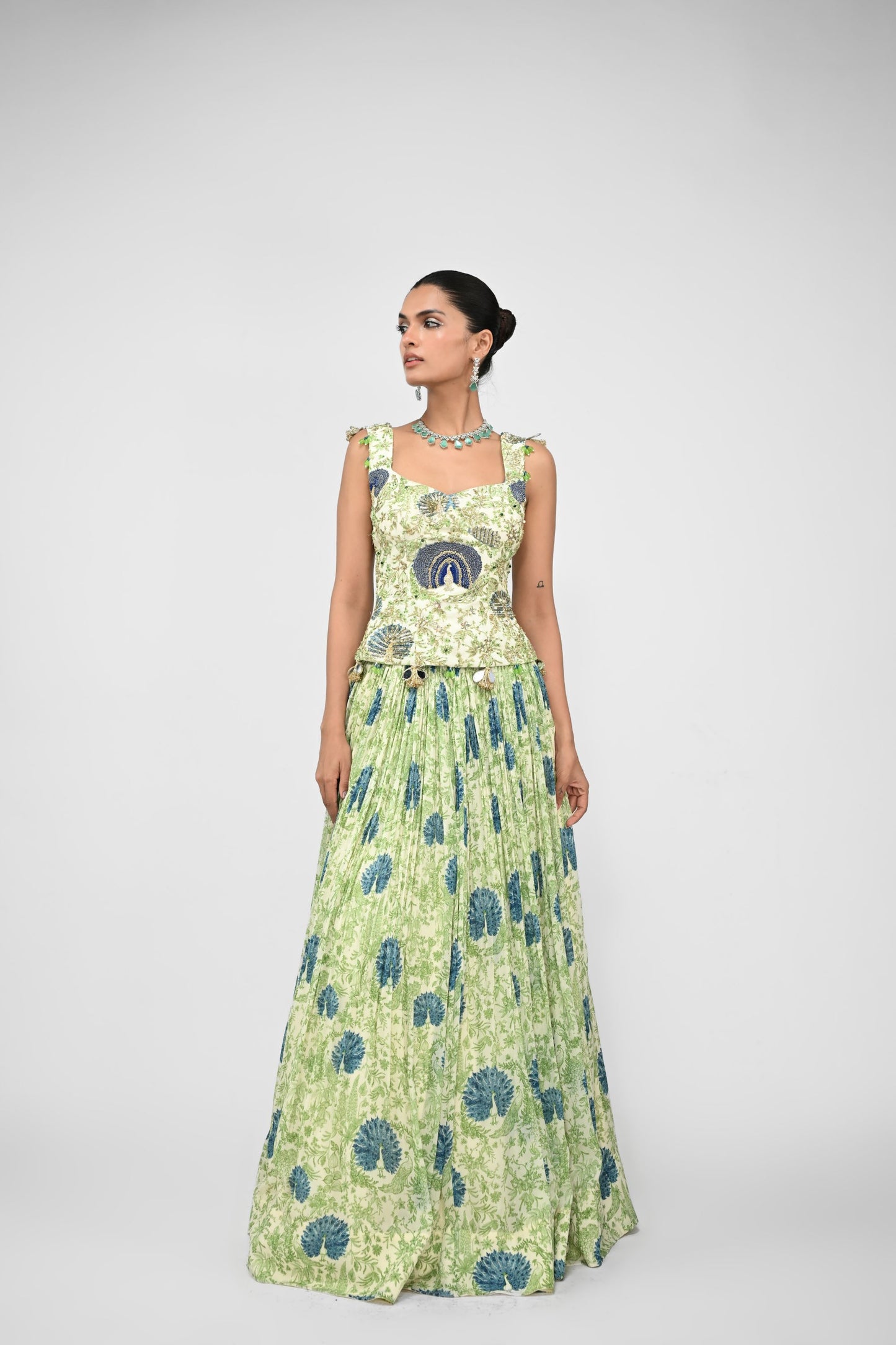 Peacock Highlighted Lehenga Paired With Highlighted Peacock Corset