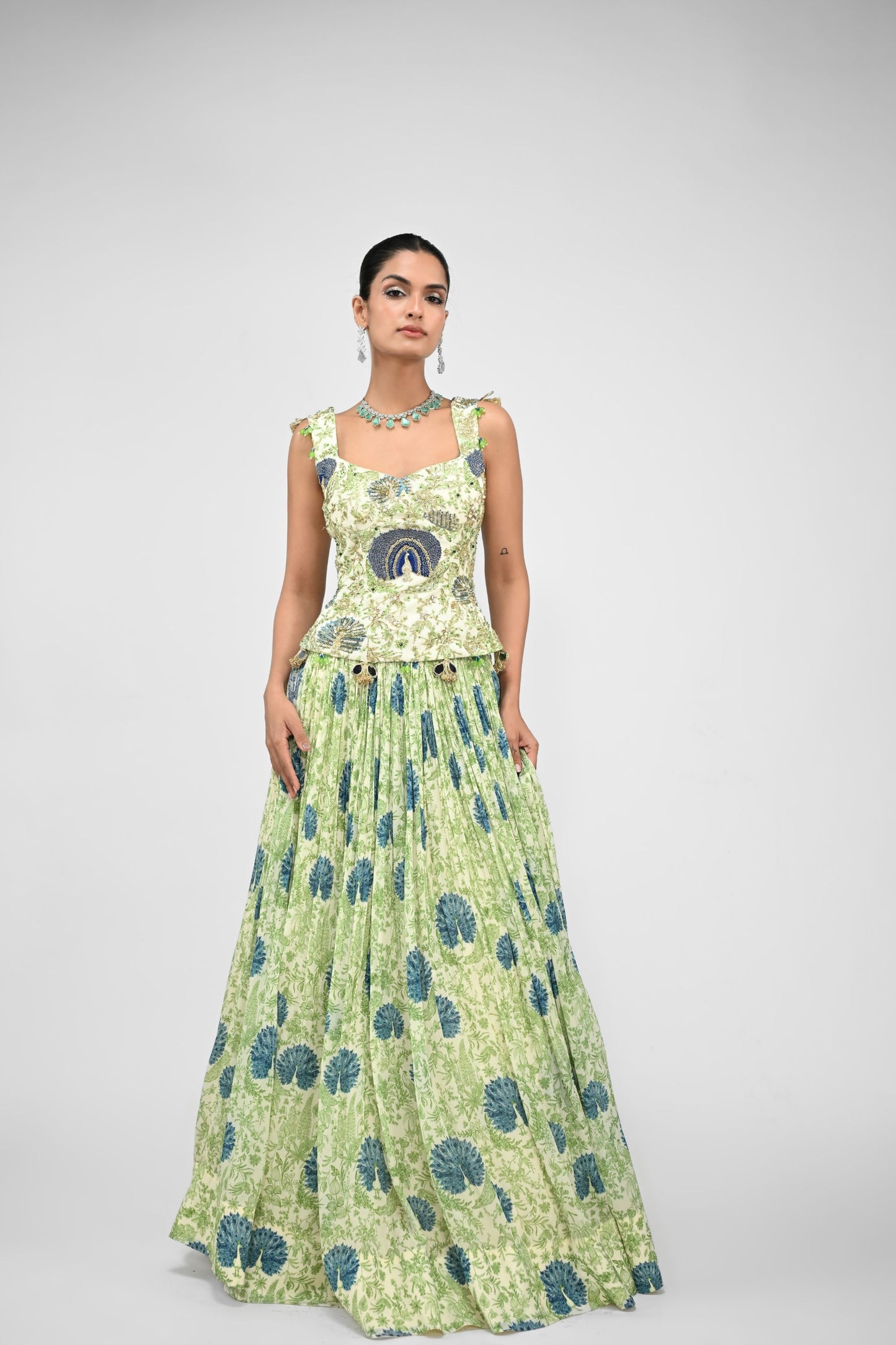 Peacock Highlighted Lehenga Paired With Highlighted Peacock Corset