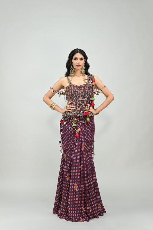 PLUM PRESTITCHED TASSEL SAREE PAIRED WITH BADLA EMBROIDERED PLUM CORSET