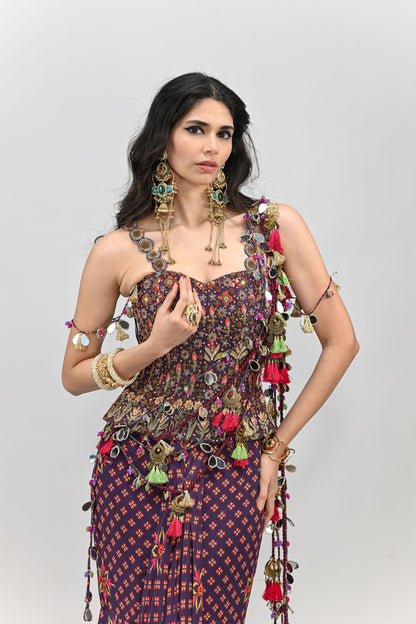 PLUM PRESTITCHED TASSEL SAREE PAIRED WITH BADLA EMBROIDERED PLUM CORSET
