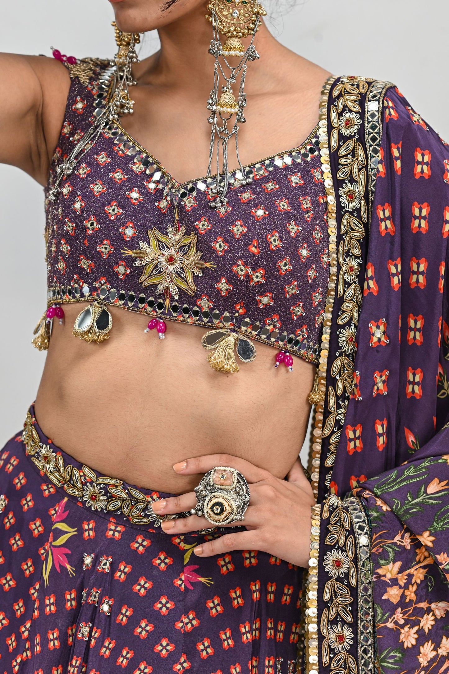PLUM HIGHLIGHTED LEHENGA PAIRED WITH PLUM BADLA BLOUSE AND HIGHLIGHTED DUPATTA