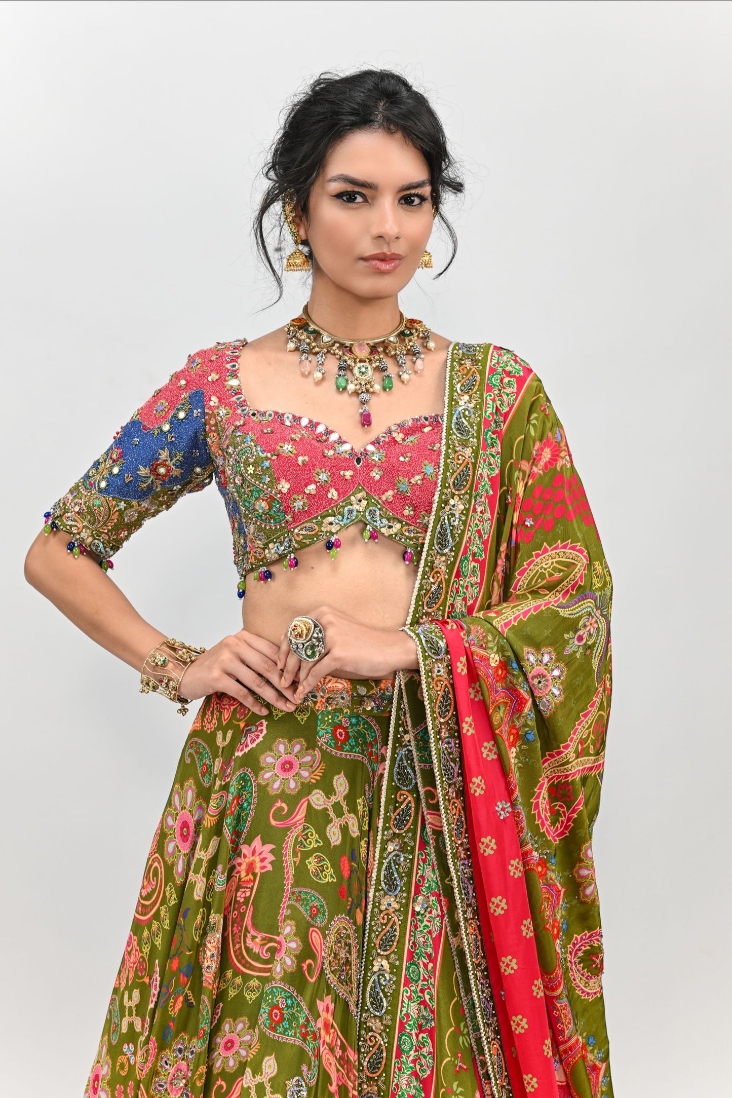 OLIVE HIGHLIGHTED LEHENGA PAIRED WITH PATCH EMBROIDERED BADLA BLOUSE AND DUAL PRINT HIGHLIGHTED DUPATTA