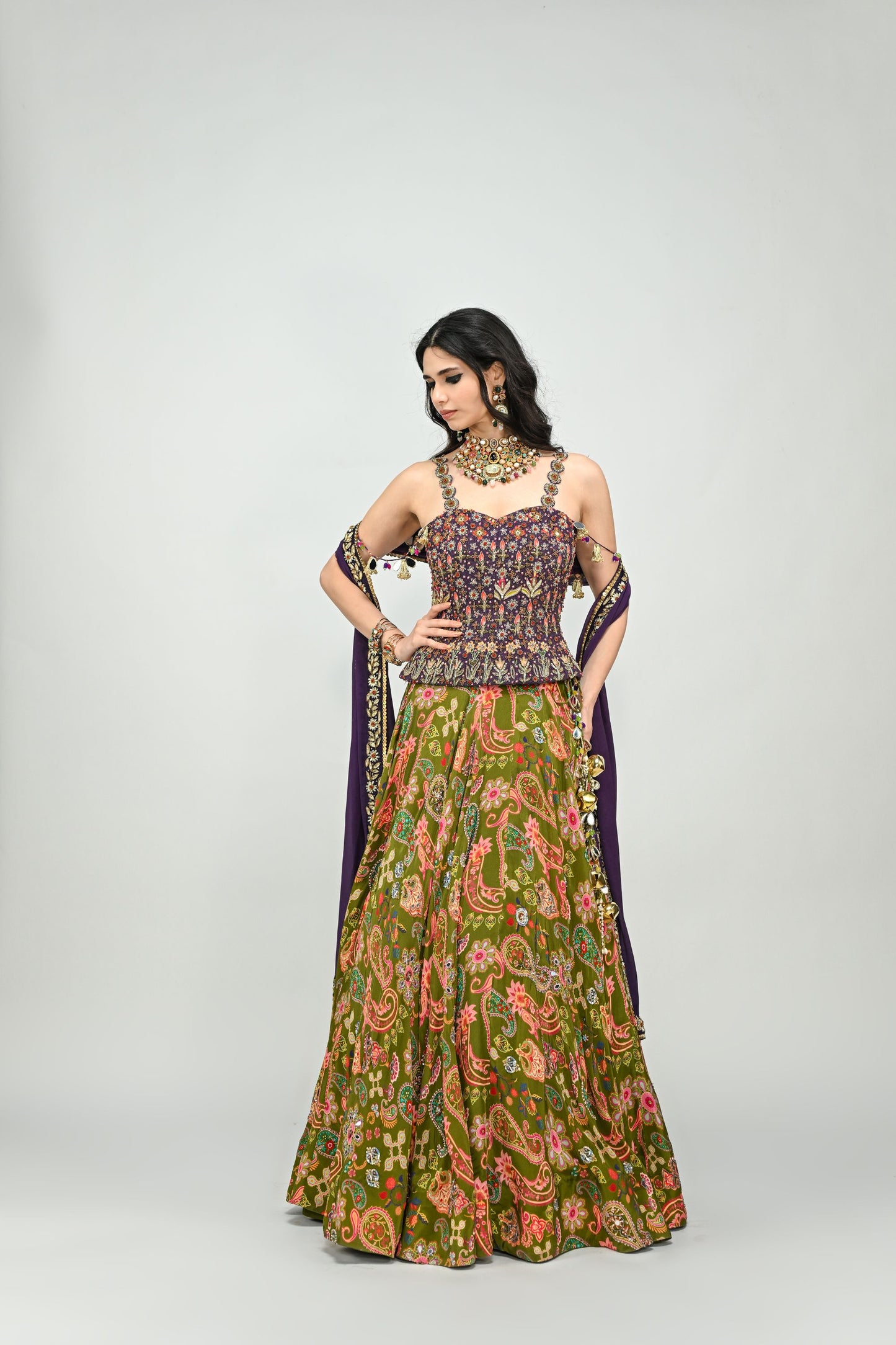 OLIVE HIGHLIGHTED LEHENGA PAIRED WITH PLUM EMBROIDERED BADLA CORSET AND DUPATTA