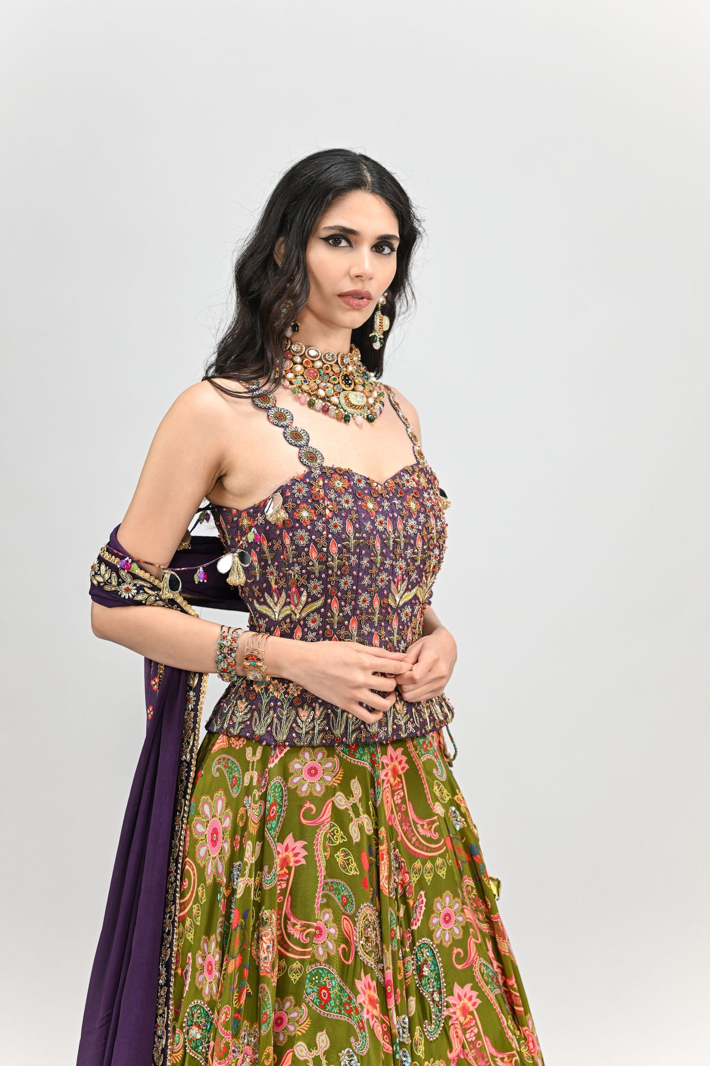 OLIVE HIGHLIGHTED LEHENGA PAIRED WITH PLUM EMBROIDERED BADLA CORSET AND DUPATTA
