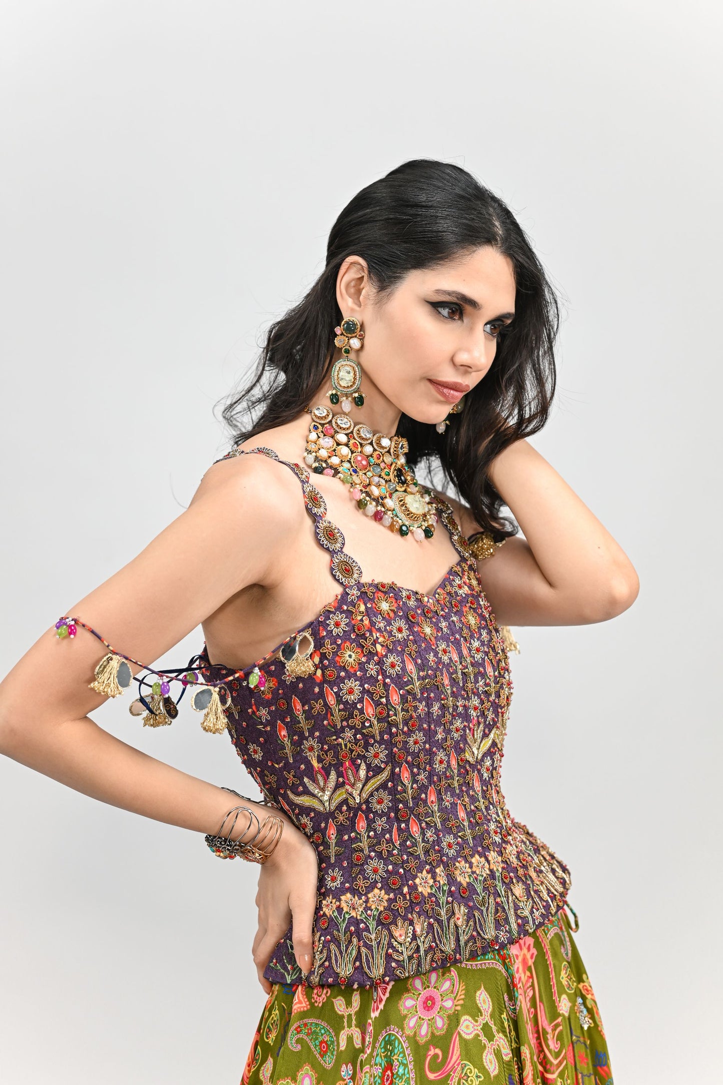 OLIVE HIGHLIGHTED LEHENGA PAIRED WITH PLUM EMBROIDERED BADLA CORSET
