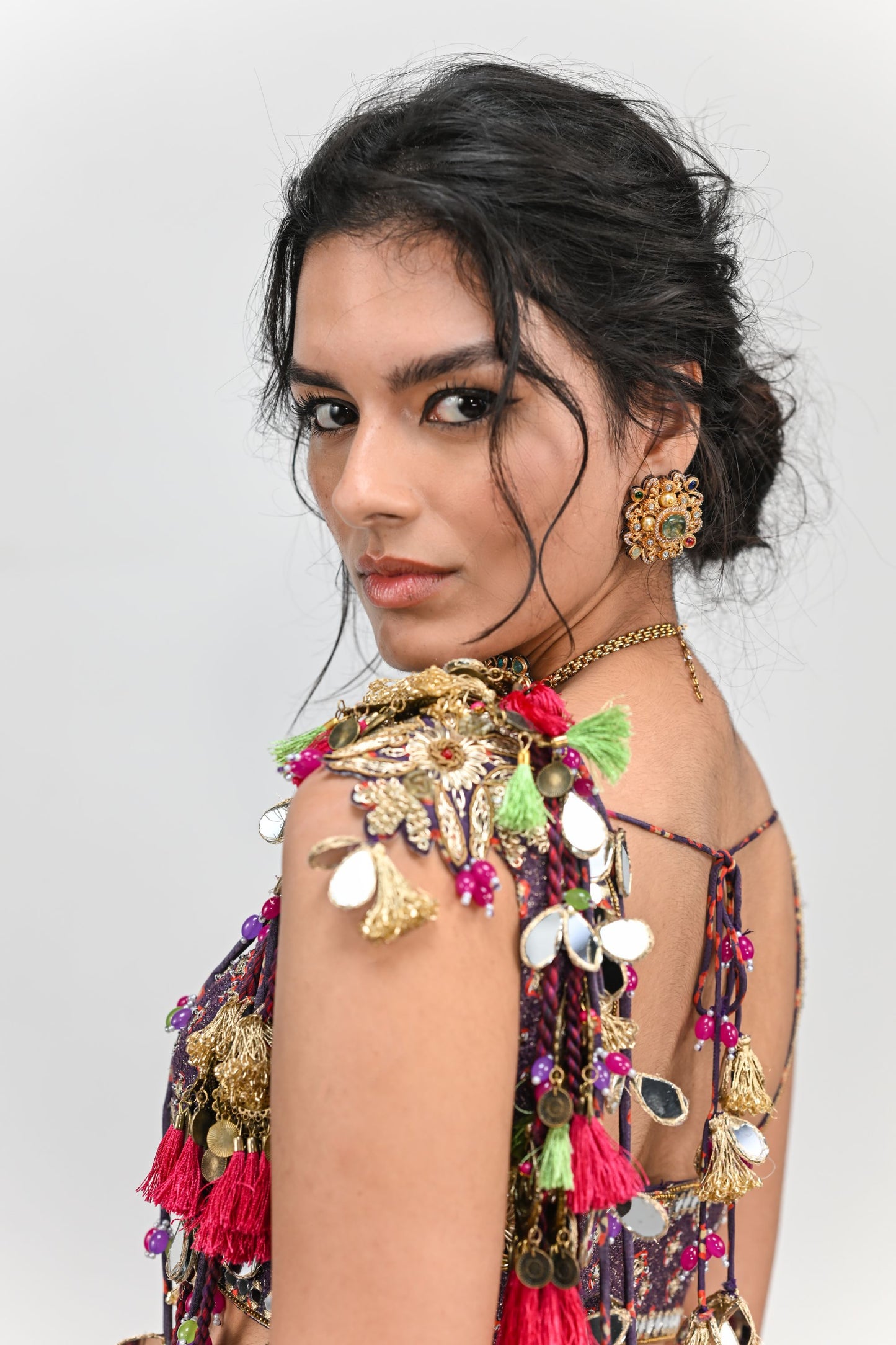 PLUM PRESTITCHED TASSEL SAREE PAIRED WITH BADLA EMBROIDERED PLUM BADLA HIGHLIGHTED BLOUSE