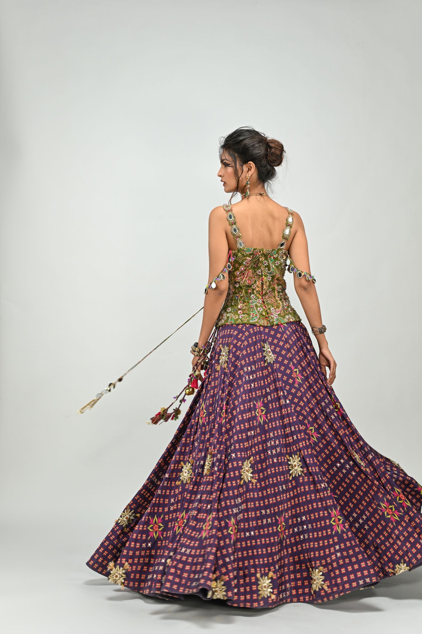 PLUM HIGHLIGHTED LEHENGA PAIRED WITH PLUM BADLA CORSET