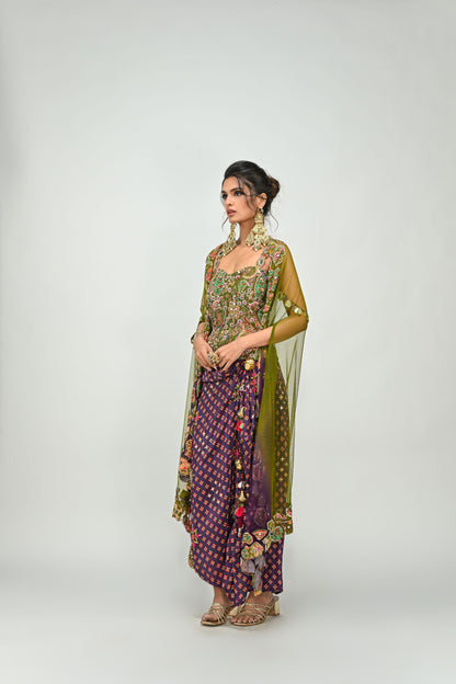 OLIVE BADLA EMBROIDERED CORSET PAIRED WITH EMBROIDERED PLUM DHOTI SET AND OMBRE APPLIQUE CAPE