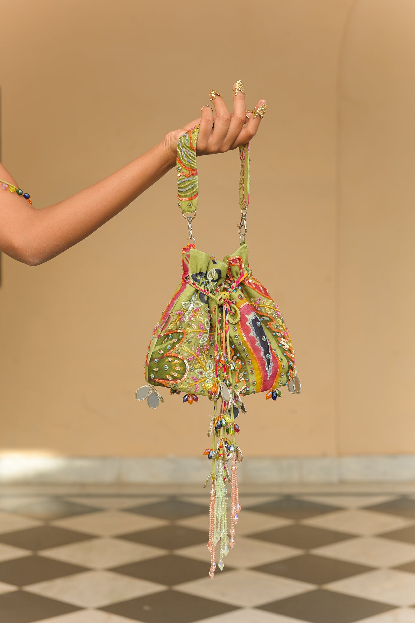 OLIVE BLOOM MIRROR WORK TASSEL POTLI
