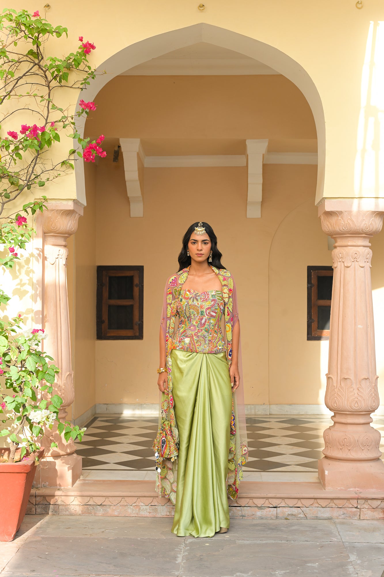 OLIVE BLOOM SEQUENCE HIGHLIGHT. CORSET PAIRED WITH THROW. MILANO SKIRT AND DUAL APPLIQUE HIGHLIGHT CAPE SET
