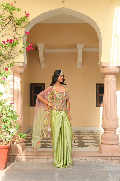 OLIVE BLOOM SEQUENCE HIGHLIGHT. CORSET PAIRED WITH THROW. MILANO SKIRT AND DUAL APPLIQUE HIGHLIGHT CAPE SET
