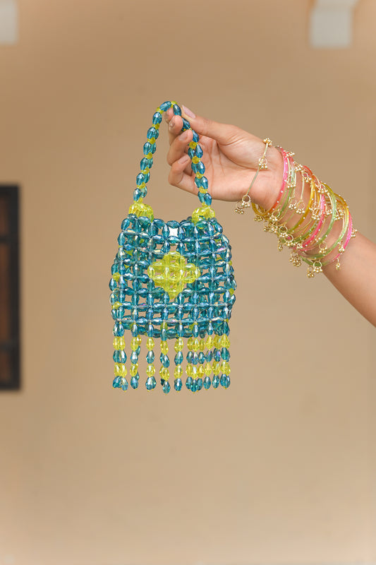 CRYTSAL IRIS MIST TASSEL POTLI