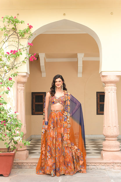 AMBER BLOOM HIGHLIGHTED LEHENGA PAIRED WITH EMBROIDERED BLOUSE AND SHADED APPLIQUE ORGANZA DUPATTA