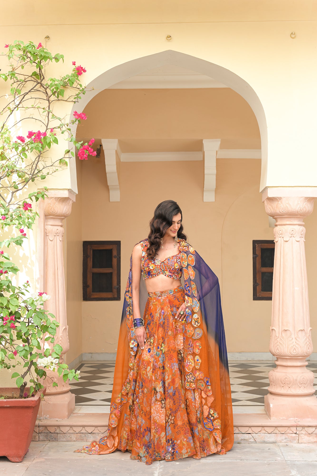AMBER BLOOM HIGHLIGHTED LEHENGA PAIRED WITH EMBROIDERED BLOUSE AND SHADED APPLIQUE ORGANZA DUPATTA