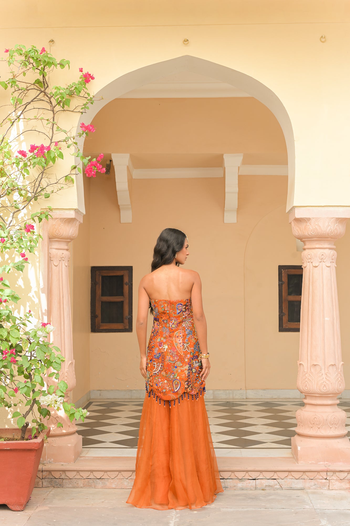 AMBER BLOOM CORSET HIGHLIGHT KURTA. PAIRED WITH KALI PANT AND DUAL APPLIQUÉ ORGANZA DUPATTA