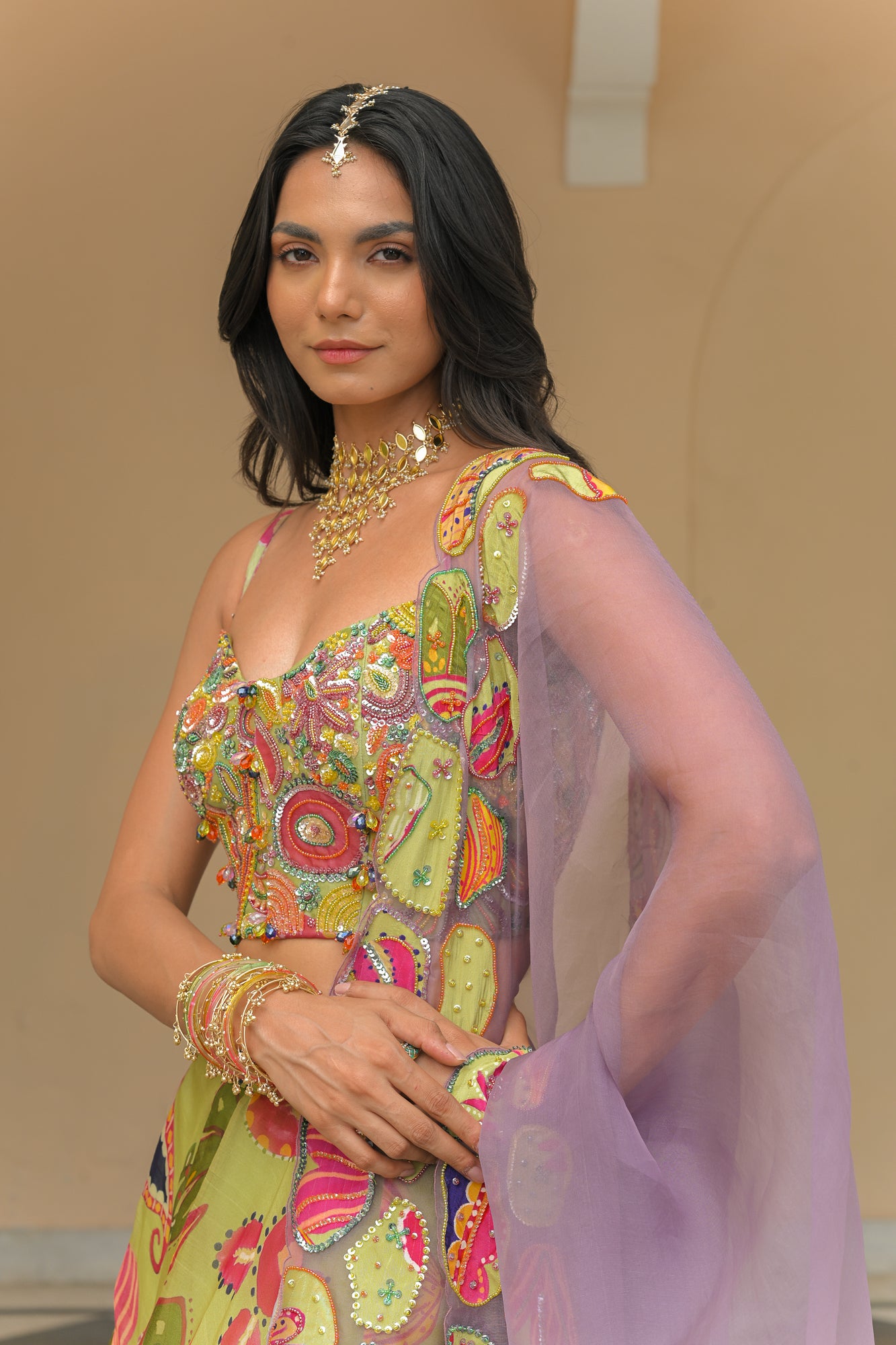 OLIVE BLOOM HIGHLIGHT LEHENGAS PAIRED WITH HIGHLIGHT CORSET AND SHADED APPLIQUÉ. HIGHLIGHT DUPATTA