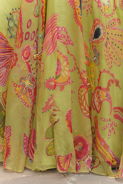 OLIVE BLOOM HIGHLIGHT LEHENGAS PAIRED WITH HIGHLIGHT CORSET AND SHADED APPLIQUÉ. HIGHLIGHT DUPATTA