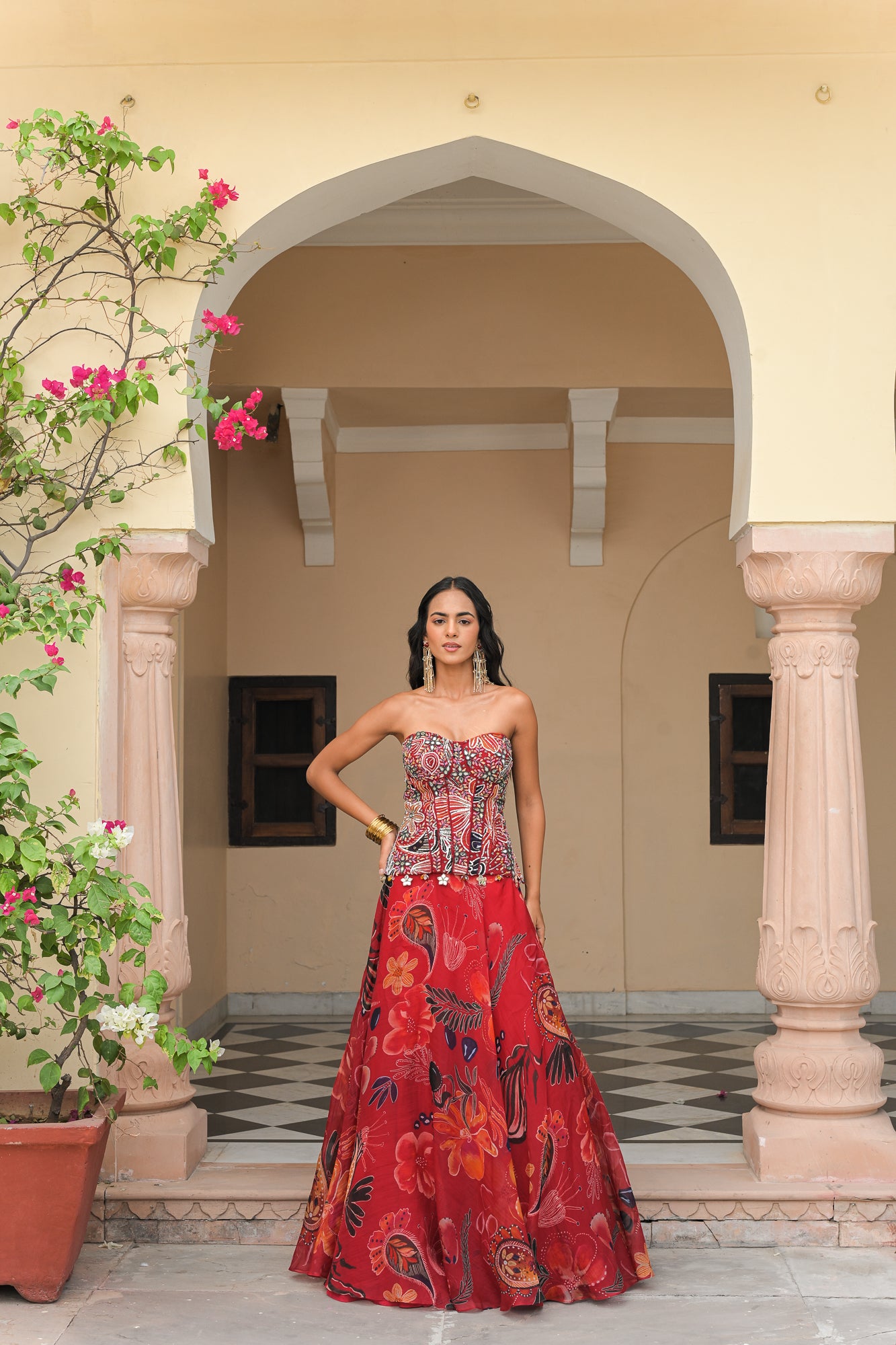 SCARLET BLOOM EMBROIDERED CORSET WITH SCARLET. BLOOM PRINTED LEHENGA