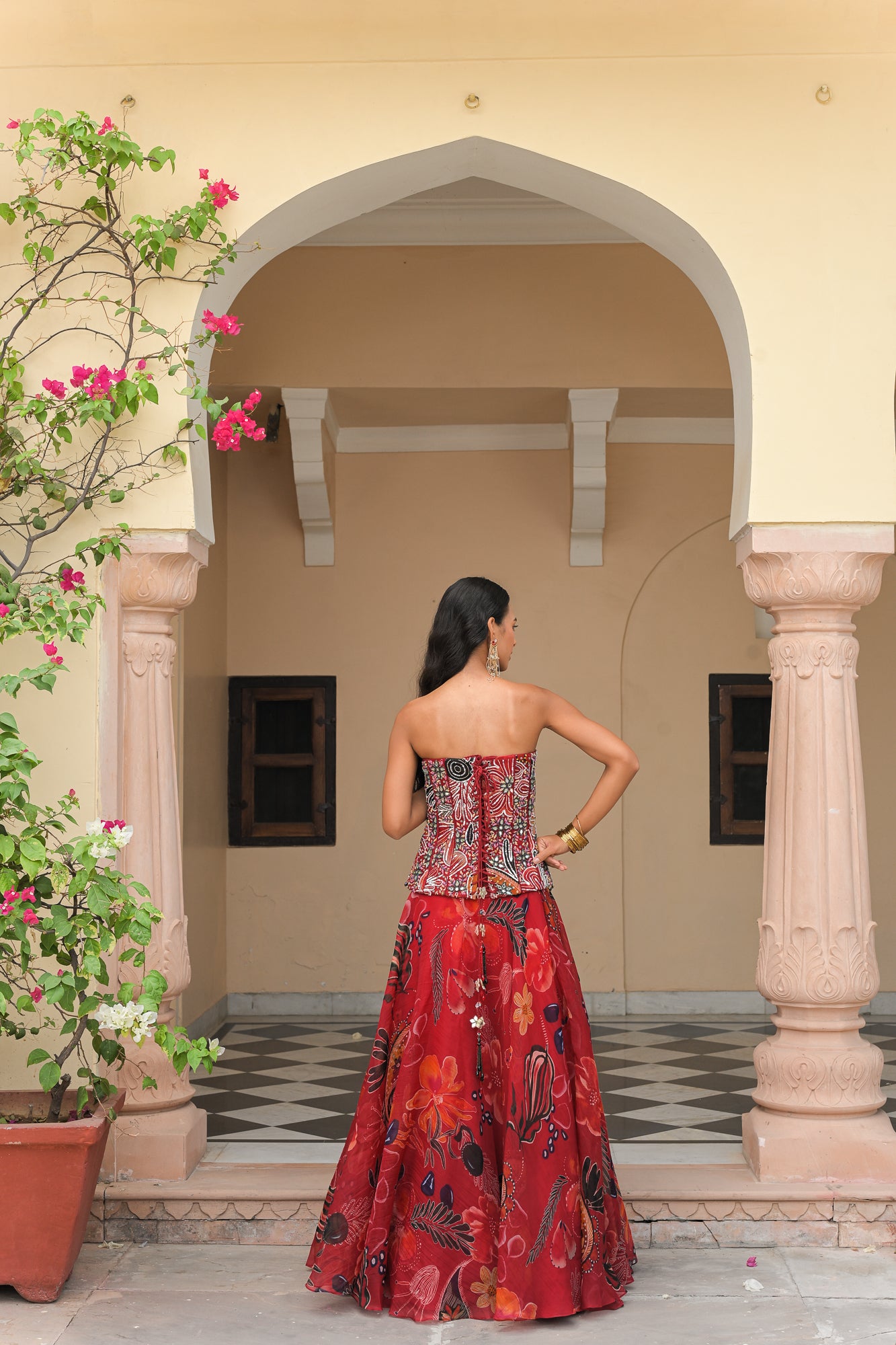 SCARLET BLOOM EMBROIDERED CORSET WITH SCARLET. BLOOM PRINTED LEHENGA