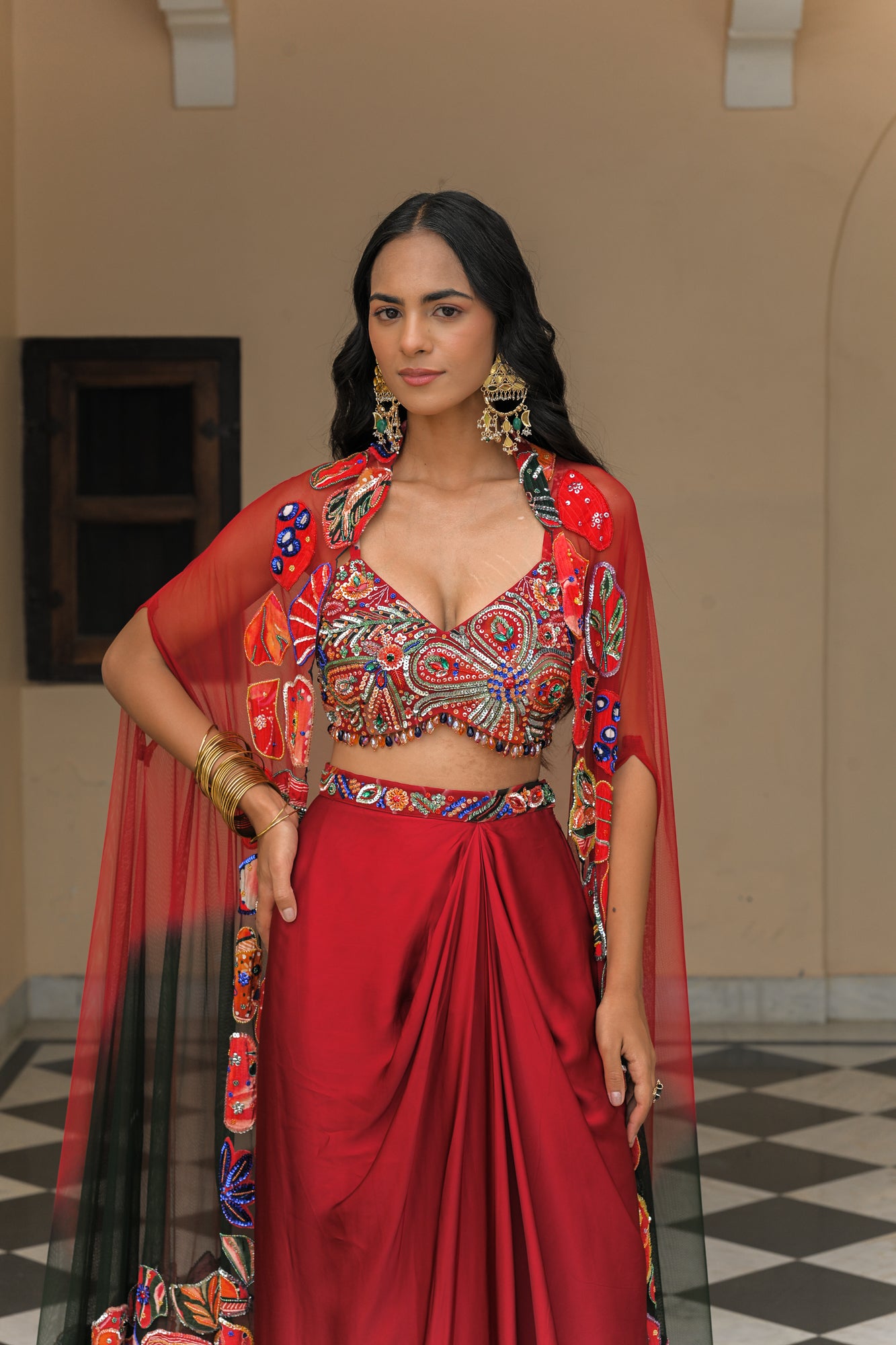 SCARLET BLOOM PRINTED HIGHLIGHT BRALETTE WITH.COWL SKIRT AND DUAL APPLIQUÉ HIGHLIGHT CAPE SET