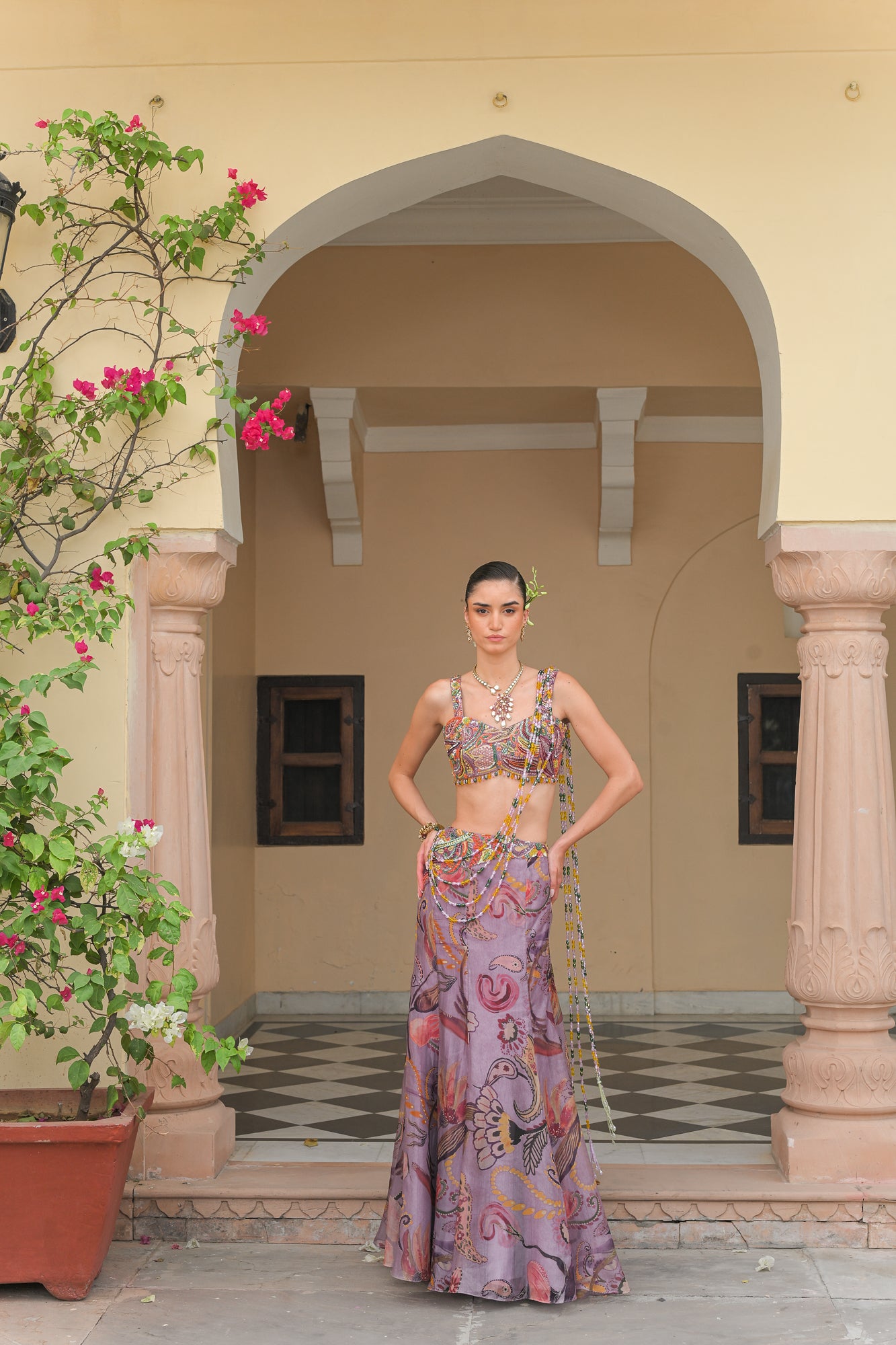VOILET BLOOM FISH TAIL SKIRT WITH ATTACHED TASSEL. PALLA AND VIOLET BLOOM EMBROIDERED CORSET BLOUSE