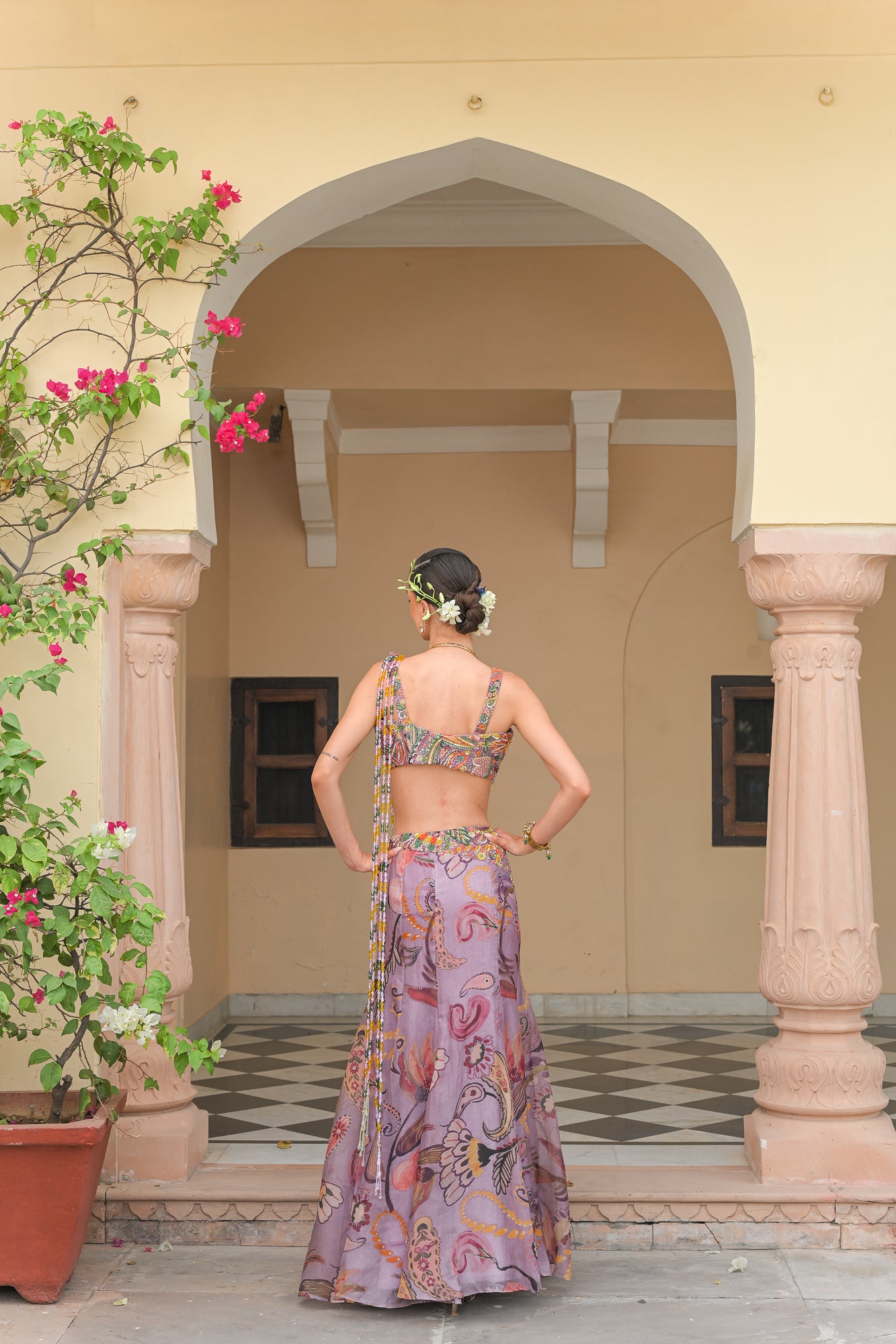 VOILET BLOOM FISH TAIL SKIRT WITH ATTACHED TASSEL. PALLA AND VIOLET BLOOM EMBROIDERED CORSET BLOUSE