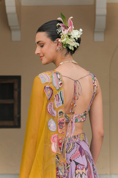 VIOLET BLOOM HIGHLIGHT LEHENGAS WITH VIOLET. BLOOM EMBROIDERED BLOUSE AND DUAL APPLIQUE HIGHLIGHT DUPATTA