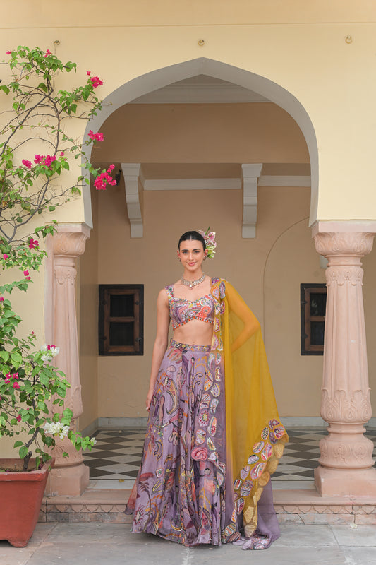 VIOLET BLOOM HIGHLIGHT LEHENGAS WITH VIOLET. BLOOM EMBROIDERED BLOUSE AND DUAL APPLIQUE HIGHLIGHT DUPATTA