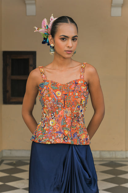 AMBER BLOOM HIGHLIGHT CORSET PAIRED WITH. NAVY BLUE COWL SKIRT SET