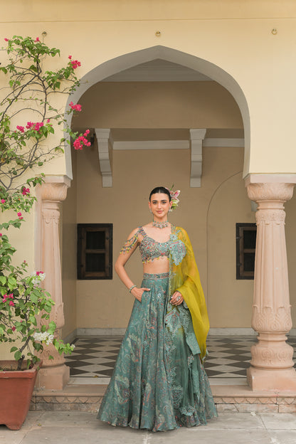 IRIS MIST HIGHLIGHT LEHENGAS PAIRED WITH PATCH HIGHLIGHT IRIS MIST BLOUSE AND THREAD WORK APPLIQUÉ PATCH HIGHLIGHT DUAL DUPATTA