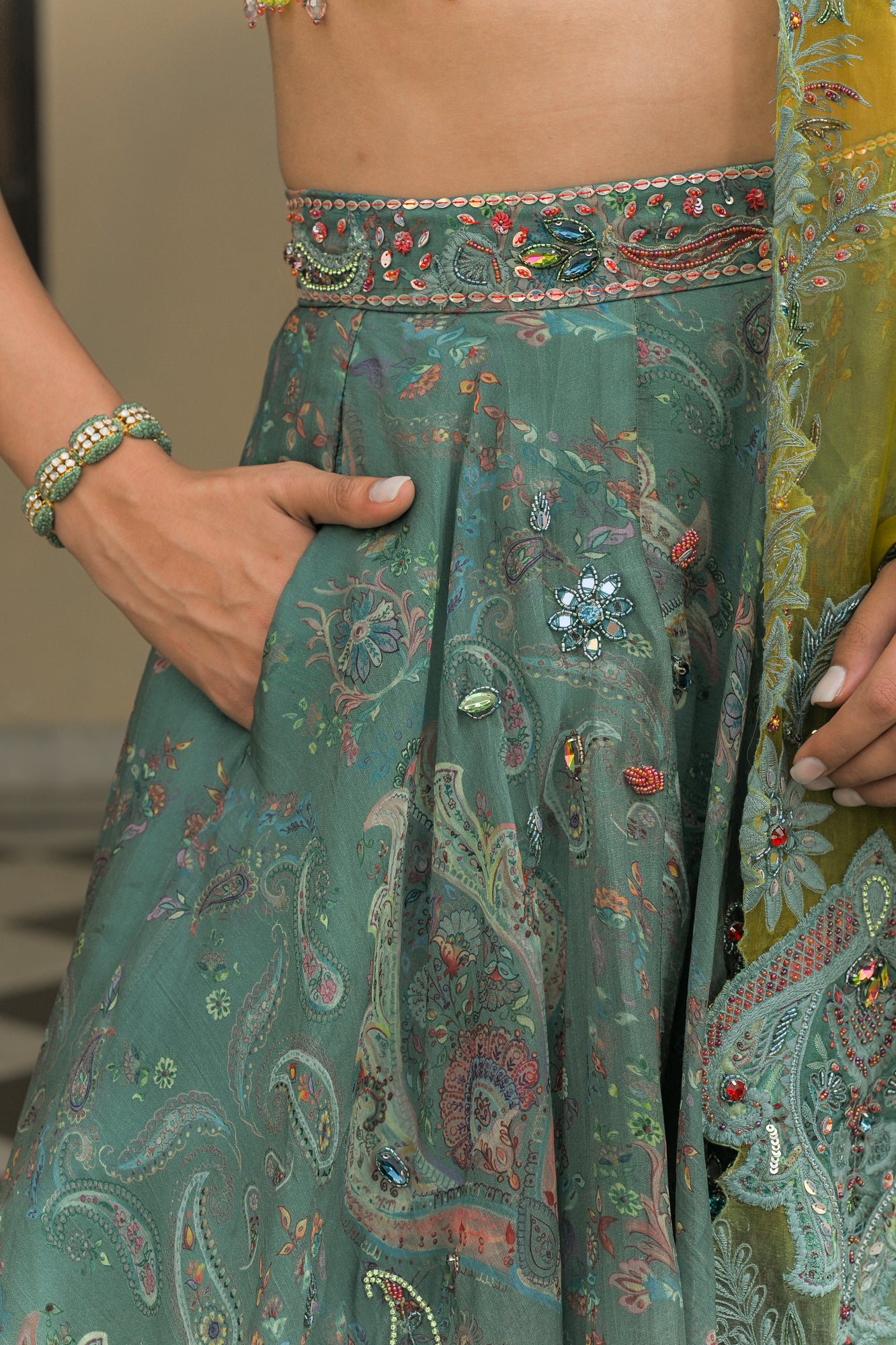 IRIS MIST HIGHLIGHT LEHENGAS PAIRED WITH PATCH HIGHLIGHT IRIS MIST BLOUSE AND THREAD WORK APPLIQUÉ PATCH HIGHLIGHT DUAL DUPATTA