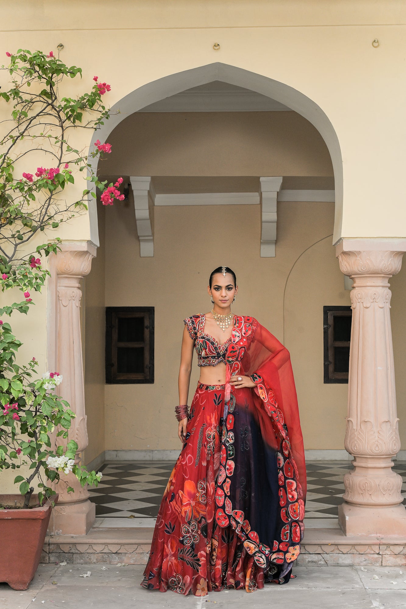 SCARLET BLOOM HIGHLIGHT LEHENGAS WITH HIGHLIGHT. EMBROIDERED BLOUSE AND DUAL APPLIQUE PATCH. HIGHLIGHT DUPATTA