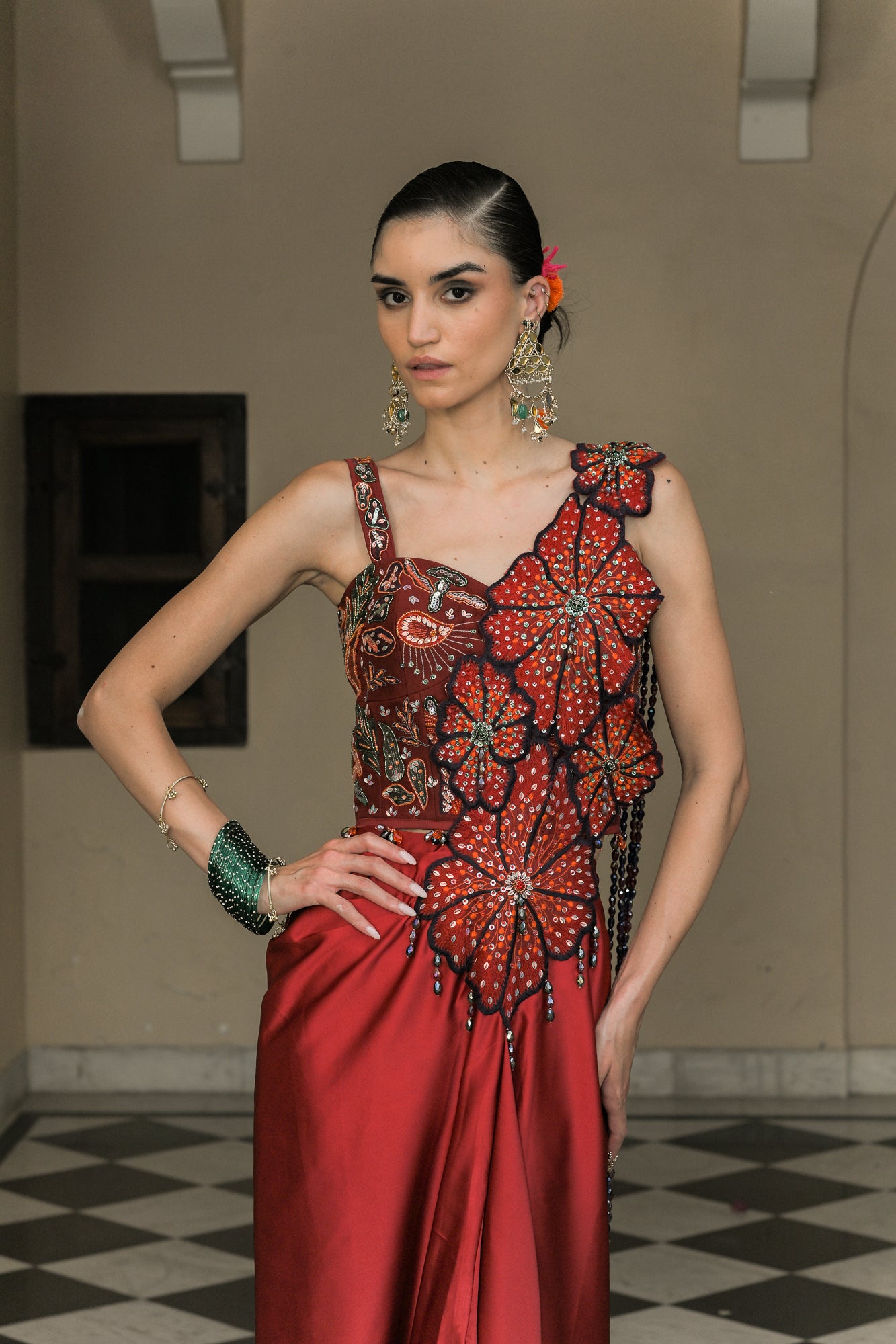SCARLETTE DHOTI FLOWER PATCH TASSEL SAREE PAIRED. WITH THREAD WORK HIGHLIGHT CORSET BLOUSE