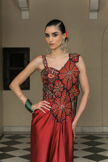SCARLETTE DHOTI FLOWER PATCH TASSEL SAREE PAIRED. WITH THREAD WORK HIGHLIGHT CORSET BLOUSE