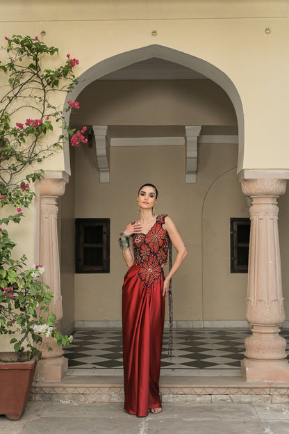 SCARLETTE DHOTI FLOWER PATCH TASSEL SAREE PAIRED. WITH THREAD WORK HIGHLIGHT CORSET BLOUSE