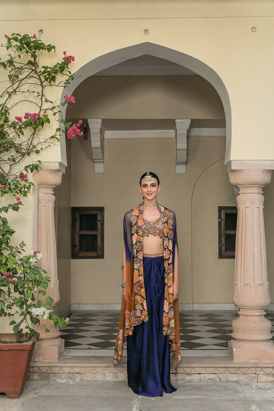 AMBER BLOOM EMBROIDERED BRALETTE PAIRED WITH SATIN COWL SET AND SHADED APPLIQUE CAPE SET