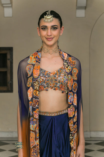 AMBER BLOOM EMBROIDERED BRALETTE PAIRED WITH SATIN COWL SET AND SHADED APPLIQUE CAPE SET