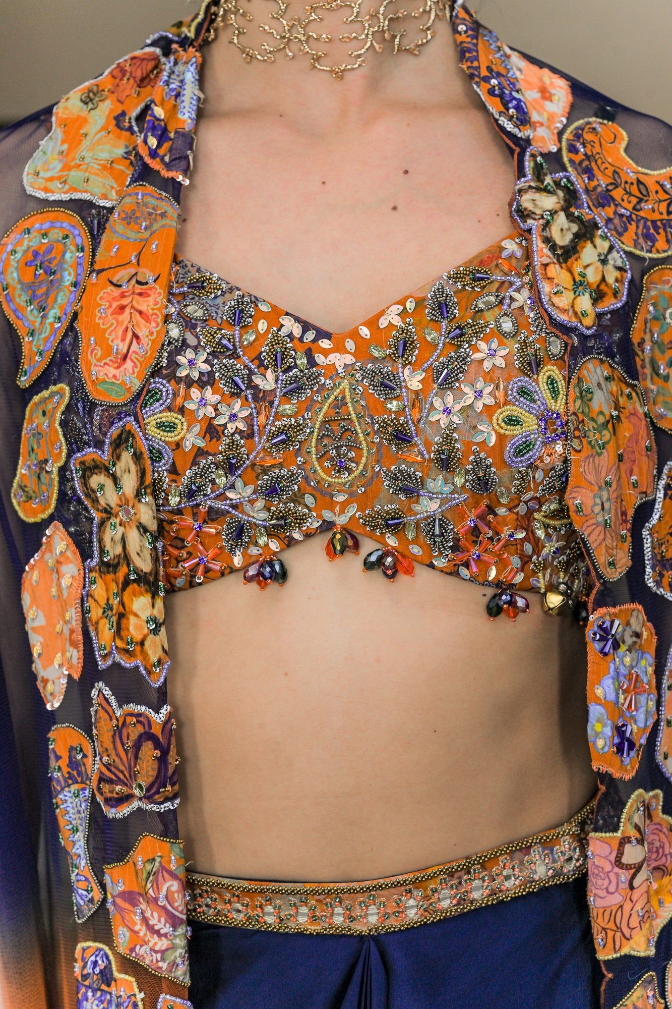 AMBER BLOOM EMBROIDERED BRALETTE PAIRED WITH SATIN COWL SET AND SHADED APPLIQUE CAPE SET
