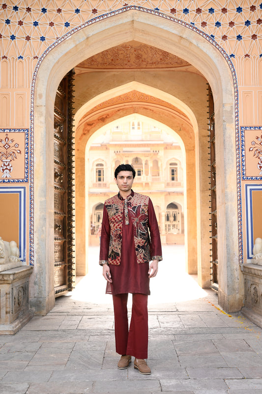 ORGANZA HIGHLIGHTED BUNDI WITH PLAIN MAROON KURTA WITH PURTIN & CUFF EMB BORDER AND FLAIR MAROON PANT