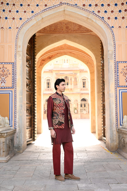 ORGANZA HIGHLIGHTED BUNDI WITH PLAIN MAROON KURTA WITH PURTIN & CUFF EMB BORDER AND FLAIR MAROON PANT