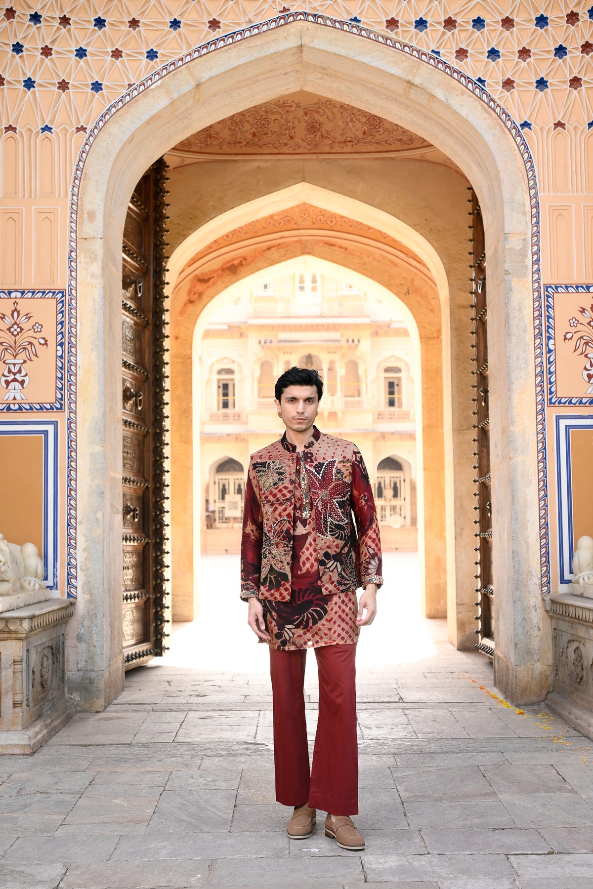 MARRON HIGHLIGHTED BUNDI WITH ORGANZA PRINTED KURTA PURTIN & CUFF EMB WITH MAROON FLAIR PANT