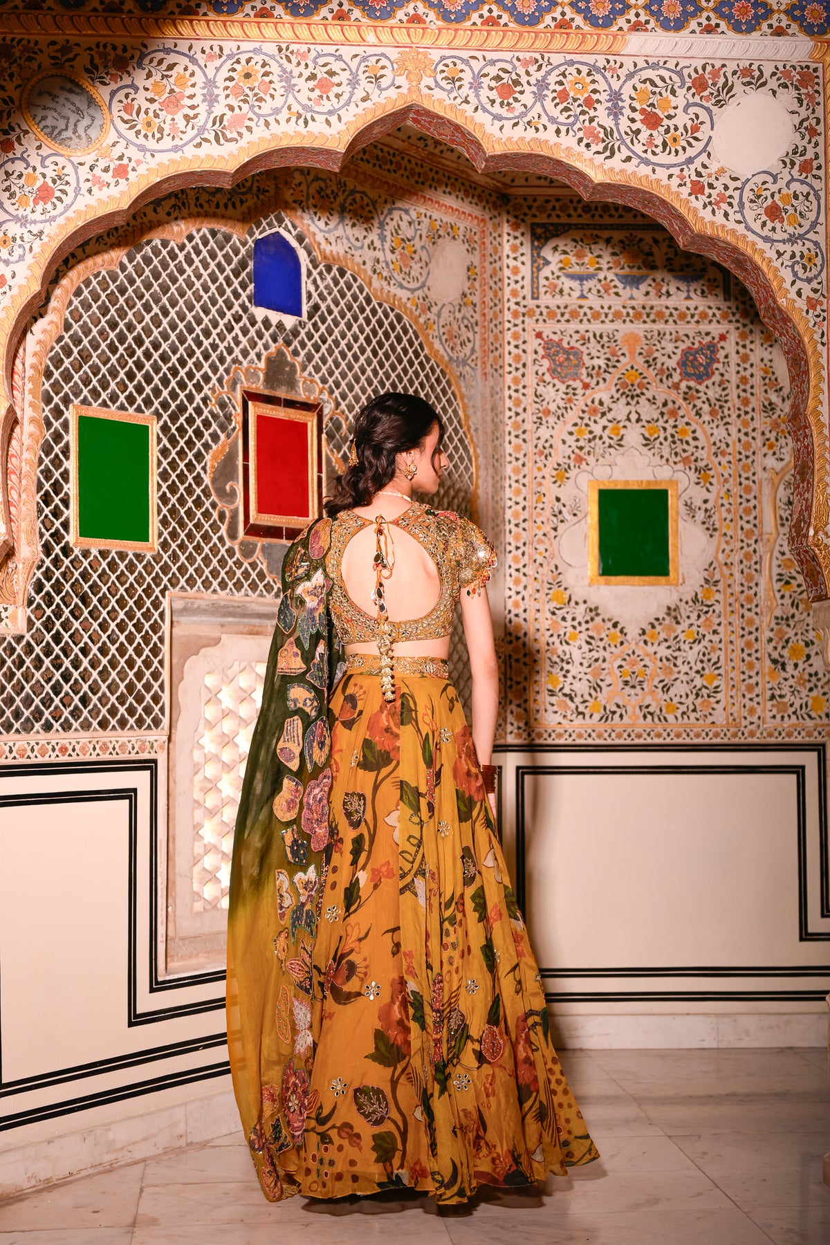EMB BLOUSE PAIRED WITH HIGHLIGHTED LEHENGA WITH APPLIQUE DUEL CAPE