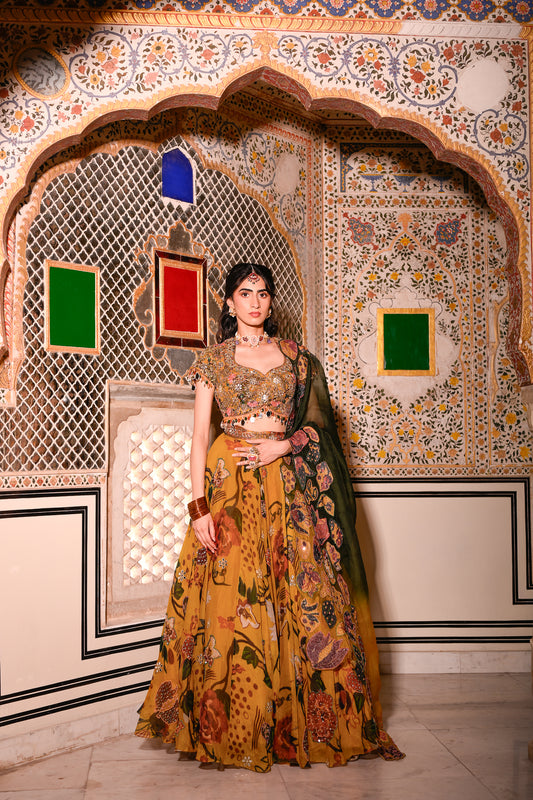 EMB BLOUSE PAIRED WITH HIGHLIGHTED LEHENGA WITH APPLIQUE DUEL CAPE