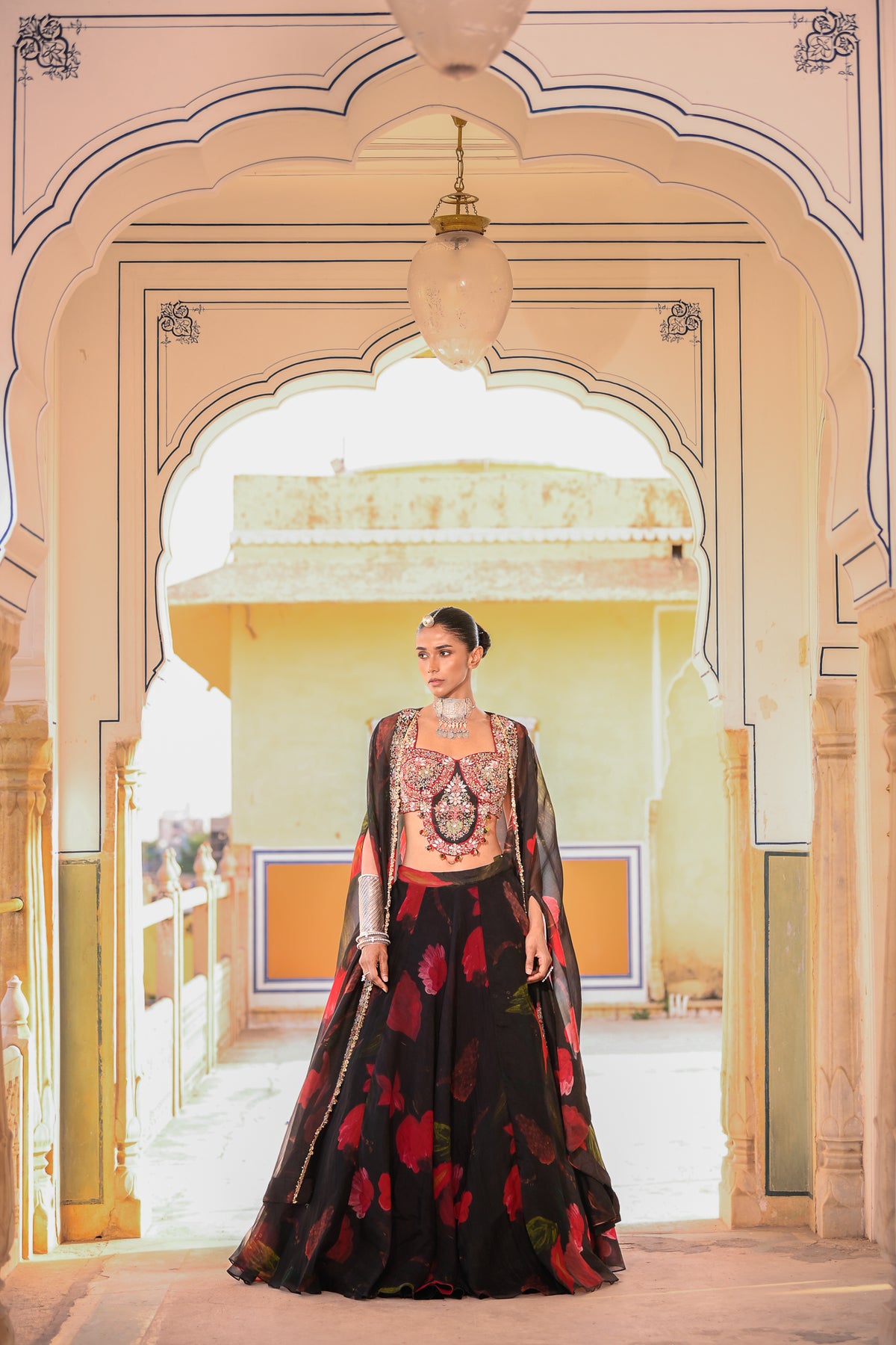 PRINTED LEHENGA PAIRED WITH EMB BRALATTE AND CAPE