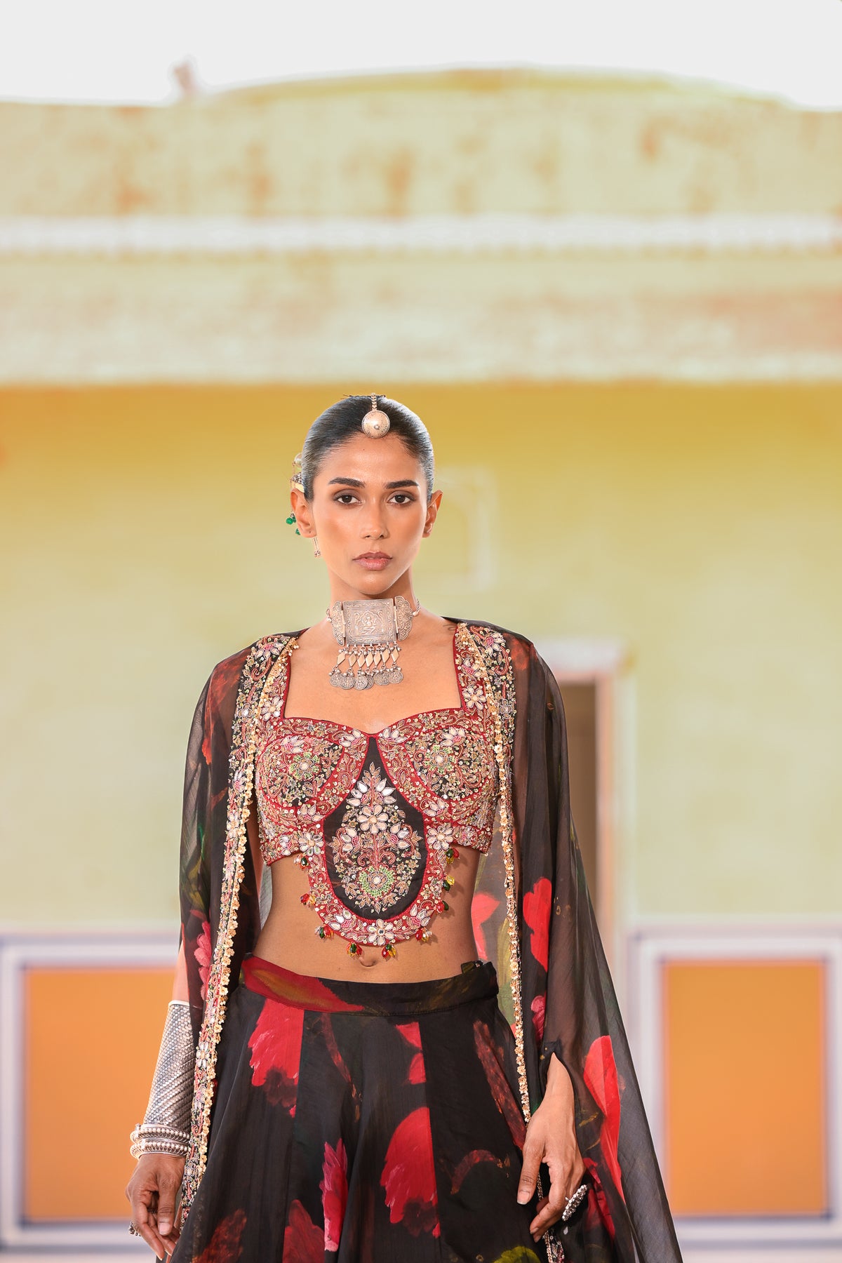 PRINTED LEHENGA PAIRED WITH EMB BRALATTE AND CAPE