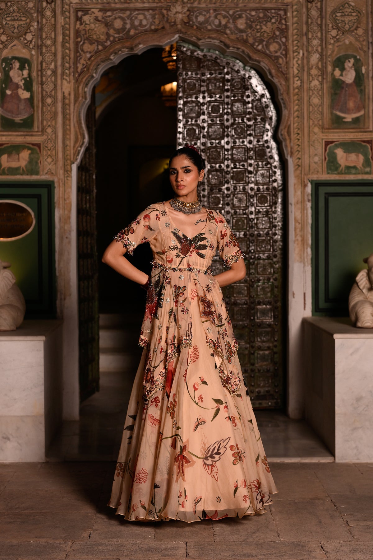 A SYMMETRICAL EMB TOP WITH PRINTED LEHENGA