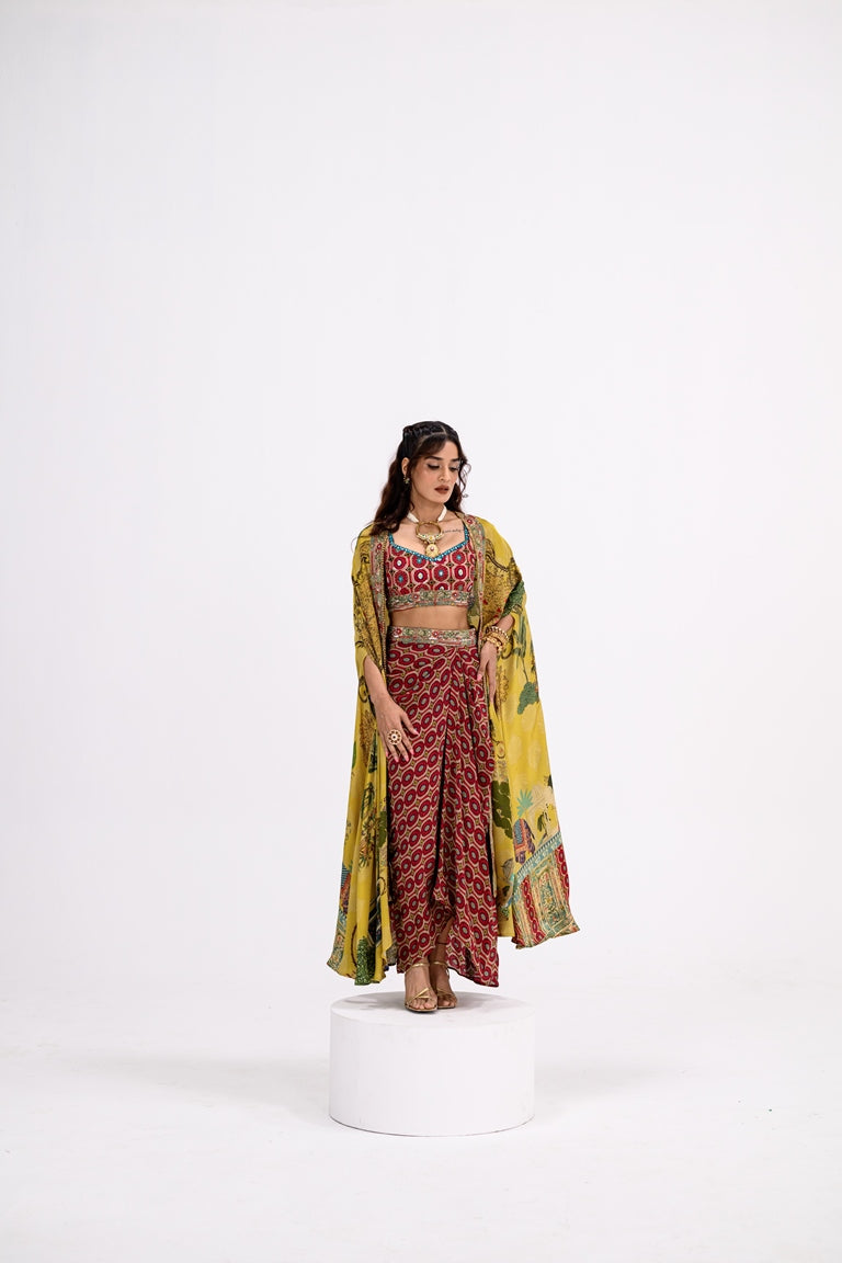 Red Honeycomb Bralette And Skirt Paired With Mustard Mughal Garden Cape