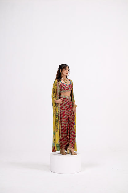 Red Honeycomb Bralette And Skirt Paired With Mustard Mughal Garden Cape