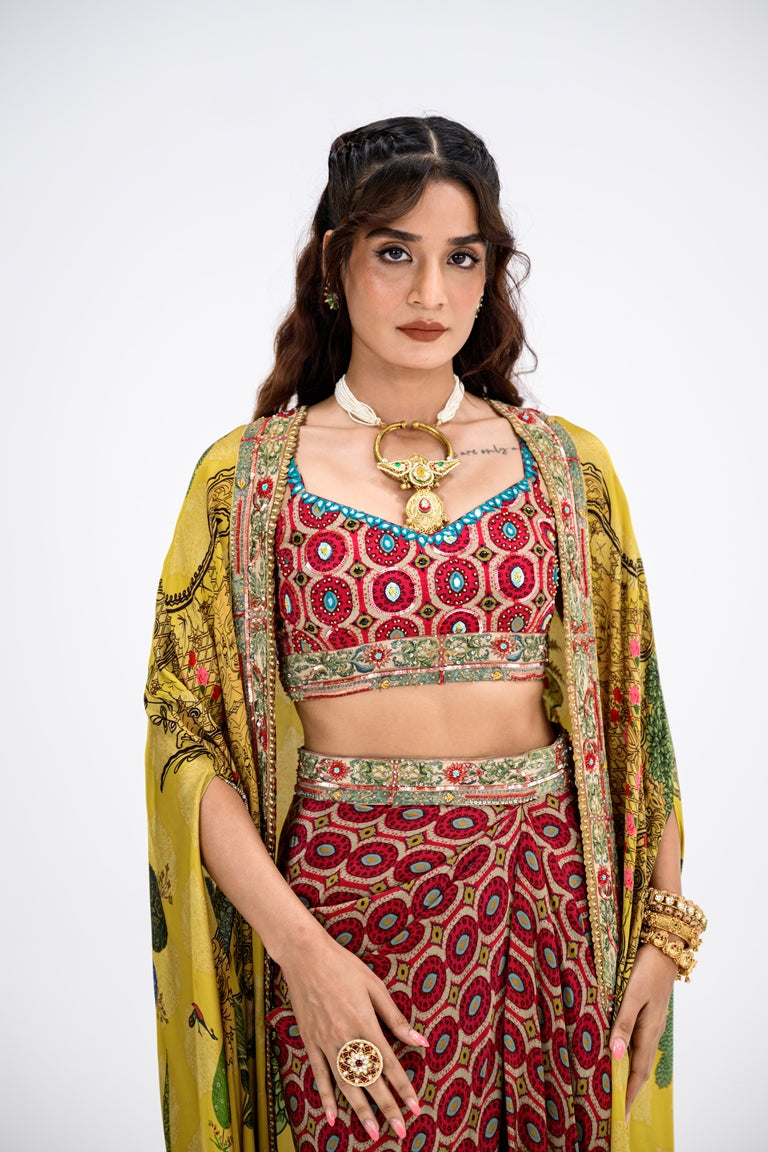 Red Honeycomb Bralette And Skirt Paired With Mustard Mughal Garden Cape